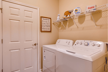 A washer and dryer in the laundry room